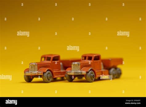 Studio Toy Still Life Against A Seamless Yellow Background Stock Photo