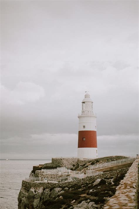 Red and White Lighthouse · Free Stock Photo