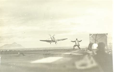 Asisbiz Fleet Air Arm Seafire Approaches For Landing Aboard Its Carrier 01