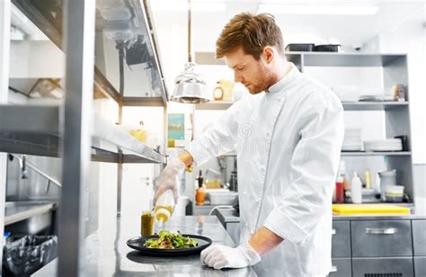 Happy Male Chef Cooking Food At Restaurant Kitchen Stock Image Image