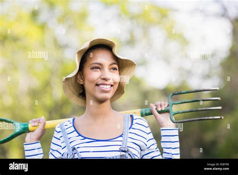 Pretty Brunette Doing Some Gardening Activities Stock Photo Alamy