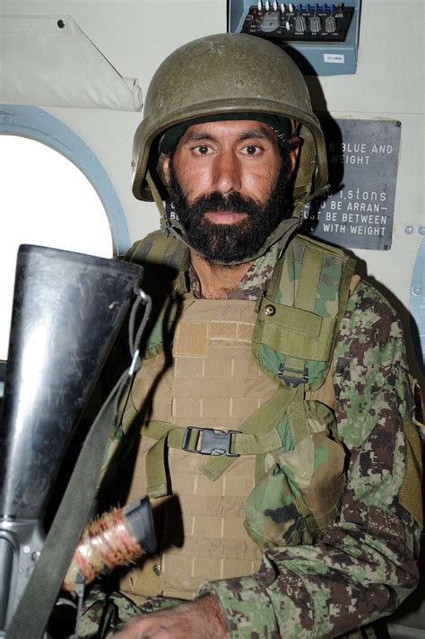 An Afghan National Army Soldier Sits In The Back Of Nara And Dvids