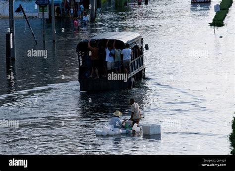 Bangkok Residents Flee Flooding On Phahon Yothin Road Bangkok