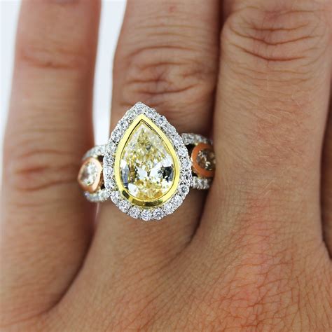 Tri Tone Gold 2.01ct Fancy Yellow Pear Shaped Diamond Engagement Ring