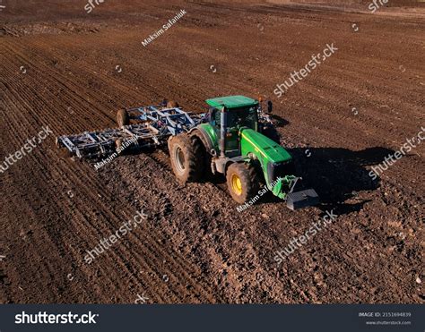 John Deere Tractor Cultivator Plowing Field Stock Photo