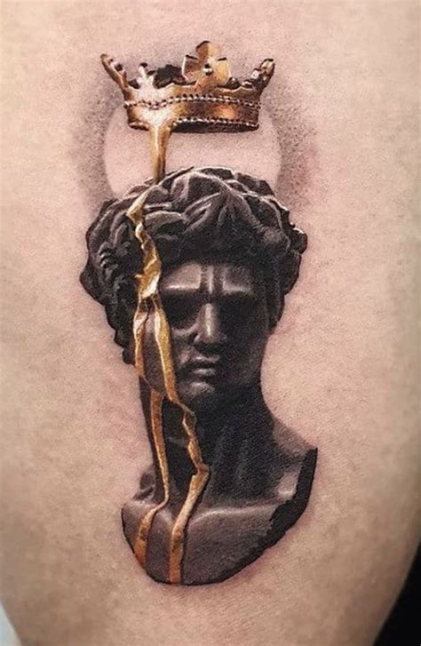 Gold Tattoo With Statue And Crown