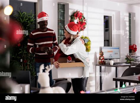 Sad Employee Packing Desk Belongings After Being Discharged On