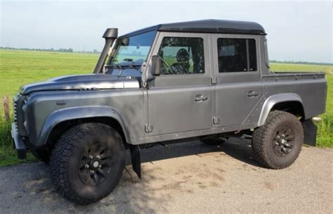 Land Rover Defender 110 Pickup Grijs Kenteken Ombouw Transcare Solutions