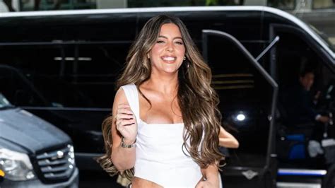 SI Swim model flaunts tiny waist loses top in risqué string bikini