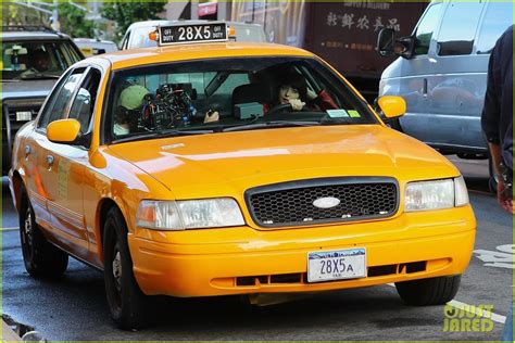 Dakota Johnson Hops Behind The Wheel Of A Taxi While Filming Madame