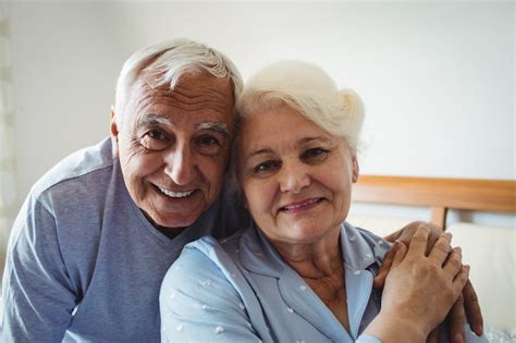 Premium Photo Senior Couple Embracing Each Other