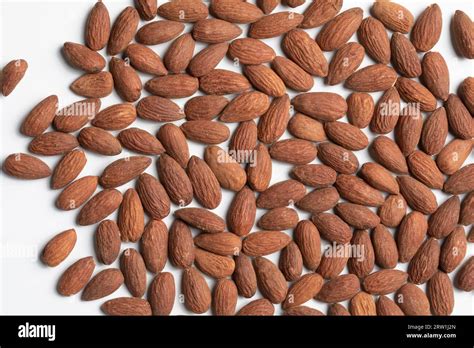 Shelled Raw Toasted Almonds Texture In White Background Stock Photo Alamy