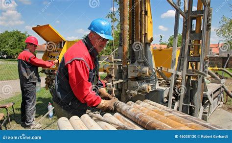 Oil Workers at Work stock photo. Image of action, equipment - 46038130