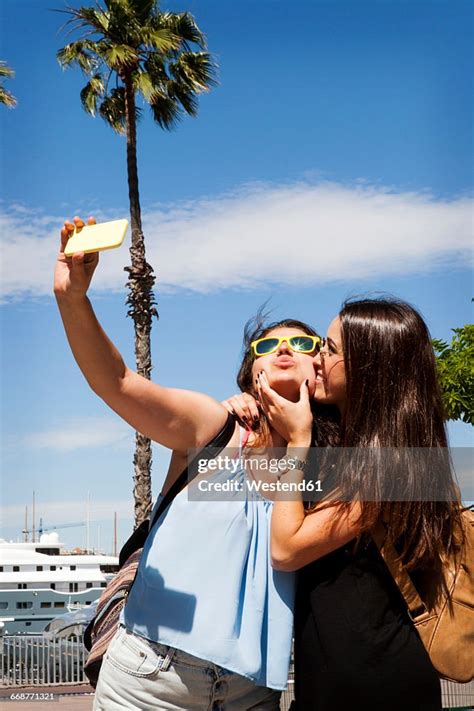 Spain Barcelomna Two Best Friends Taking Selfie With Smartphone High