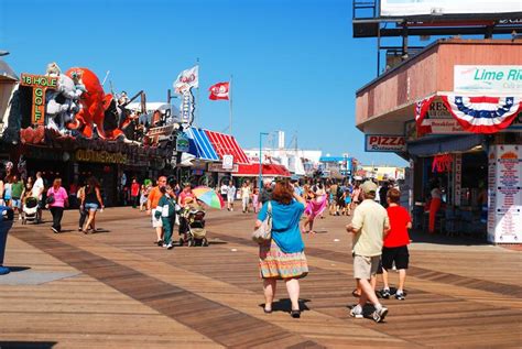 Families Enjoy A Sunny Summerâ€™s Day On The Boardwalk Editorial Stock