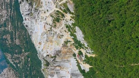 Aerial Backward Revealing Shot Of Marble Quarry In Apuan Alps Carrara