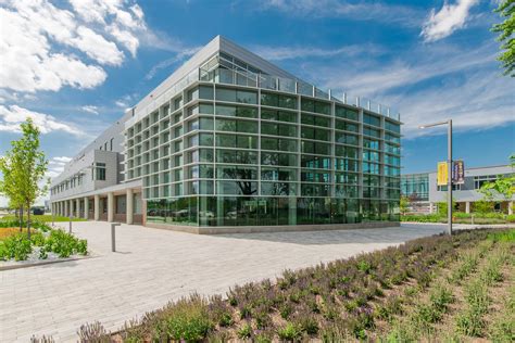 Western Illinois University Quad Cities Riverfront Campus by Holabird & Root - Architizer