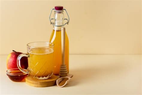 Premium Photo Glass Mug Of Fresh Organic Apple Cider With Honey And