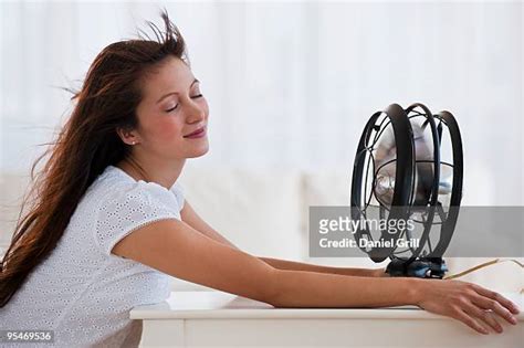 Fan Blowing Photos and Premium High Res Pictures - Getty Images