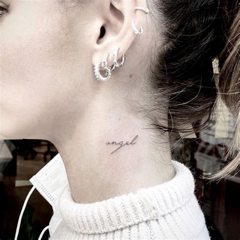 Angel Lettering Tattoo On The Neck