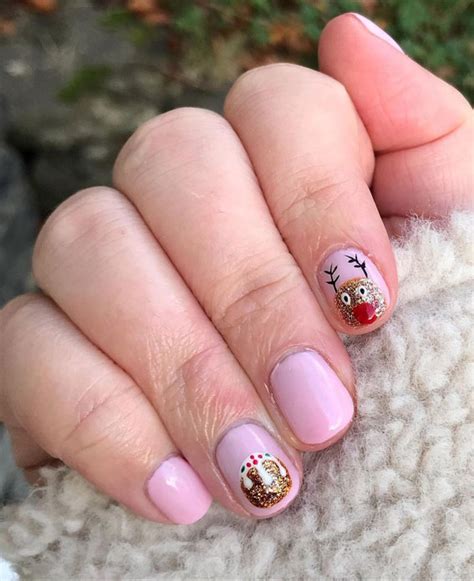 50 Best Festive Christmas Nails Reindeer White Almond Nails