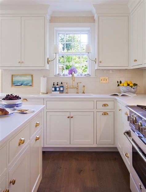 Polished Brass Cup Pulls With White Cabinets Cottage Kitchen