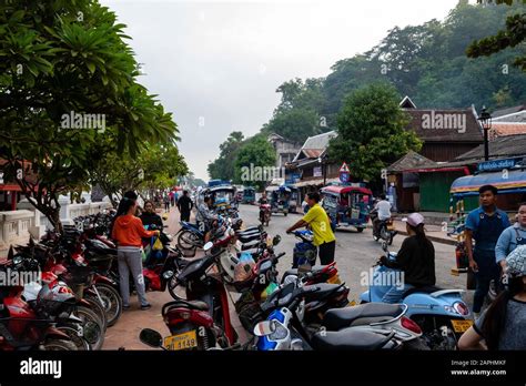 Motor Scooters Line A Street In Luang Prabang Laos Stock Photo Alamy