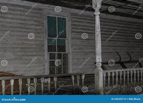 Abandoned Old Dilapidated Small Wooden House With Broken Windows And