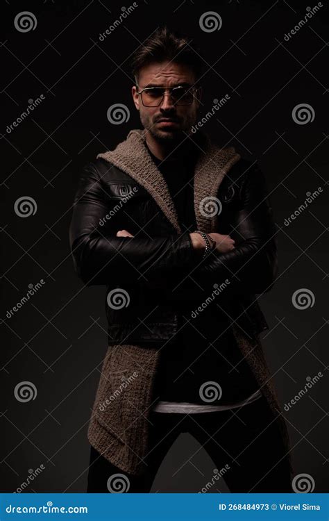 Guy With Cool Hairstyle In Black Suit On Naked Body He Raised His Hands And Posing Sideways On