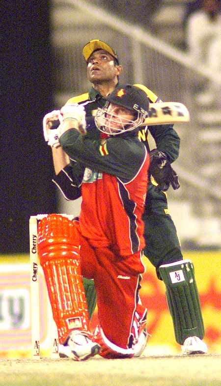 Andy Blignaut Hoiks This One As Rashid Latif Looks On ESPNcricinfo