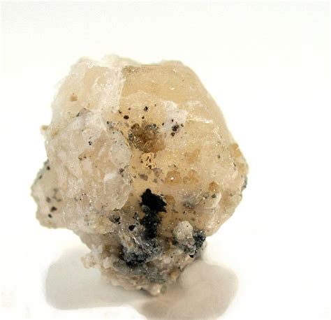 Cryolite Gemstone: Properties, Meanings, Value & More