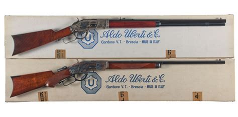 Two Italian Reproduction Lever Action Rifles With Original Boxes A Uberti Model 1873 Rifle