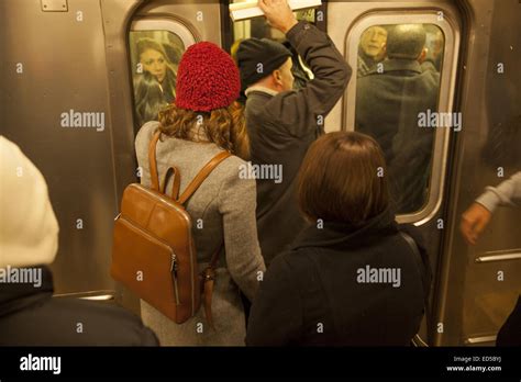 Man Tries To Squeeze Into A Subway Car When The Doors Were Closing At