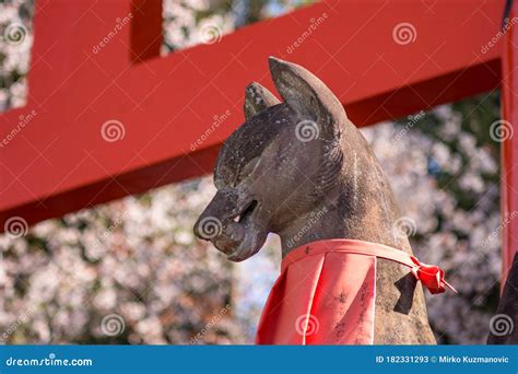 Statue Of A Kitsune Japanese Shinto Red Fox God In Fushimi Inari In