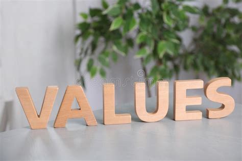 Word VALUES Made Of Wooden Letters On Light Table Stock Photo Image