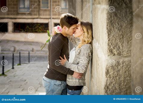 Beautiful European Woman Pointing At Cameraman And Winking Stock Image