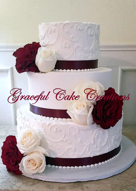 Elegant White Butter Cream Wedding Cake With Burgundy Ribb Flickr