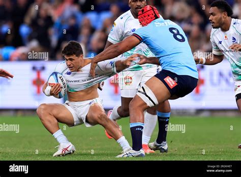 Caleb Muntz Of Fijian Drua Is Tackled During The Super Rugby Pacific