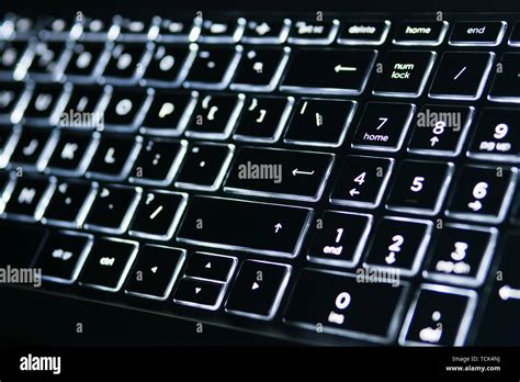 Illuminated Keyboard. White light on the laptop keyboard Stock Photo ...