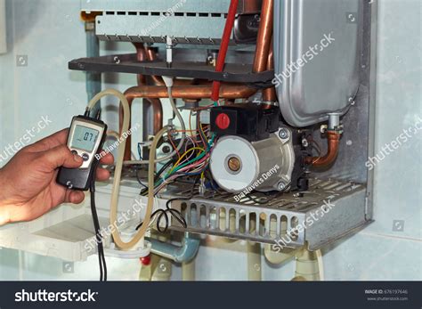 Checking Boiler Setting Over 436 Royalty Free Licensable Stock Photos