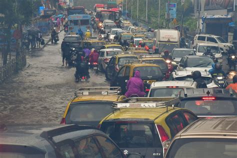 Mumbai Rains Imd Issues Warning Amid Severe Waterlogging Train