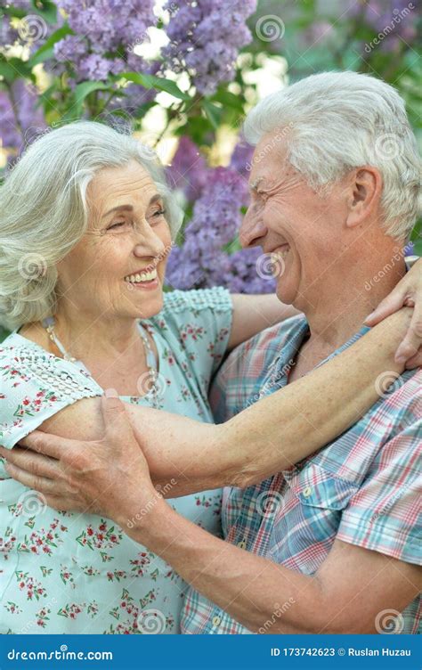 Close Up Portrait Of Beautiful Senior Couple Hugging Stock Image