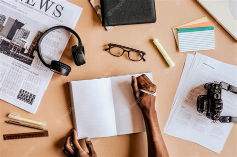 Premium Photo Black Man Writing On A Notebook