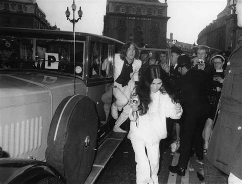 Candid Photographs Of The Beatles At The Premiere Of The Animated Film