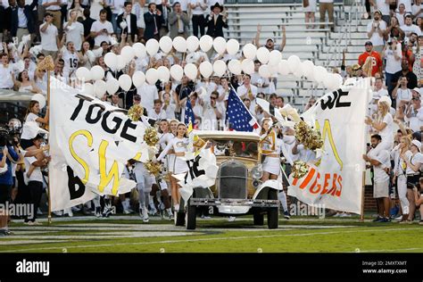 The Rambling Wreck Leads The Georgia Tech Yellow Jackets Onto The Field