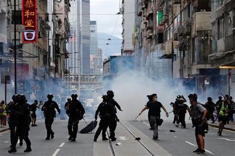 Hong Kong Police Make First Arrests Under New Security Law Amid Fears