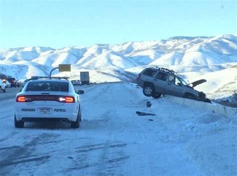 Black Ice Lands Suv On The Edge Of A Barrier Ravine In Utah East