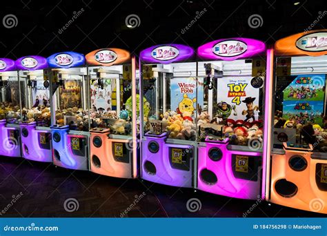 Colorful Claw Machines In A Penny Arcade Crane Game It Is To Try And