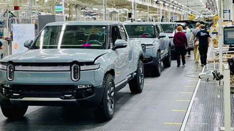 Rivian Reports Q Sales Drop Cuts Production Forecast