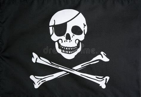 Jolly Roger Pirate Flag. Jolly Roger symbol with eye patched skull and ...